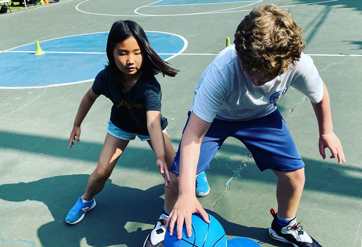 Hone your skills at sports camps. Photo courtesy of Hoops University Basketball Camps